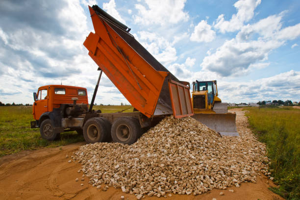 Unloading the stone. Construction of roads. Unloading the stone. Construction of roads.
