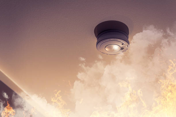 home safety - smoke detector on ceiling detecting house fire home safety - smoke detector on ceiling detecting house fire