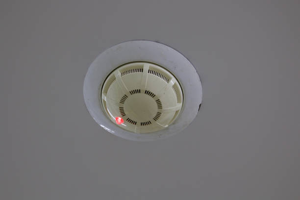 Fire detector with a red bulb on the ceiling. Fire detector with a red bulb on the ceiling.
